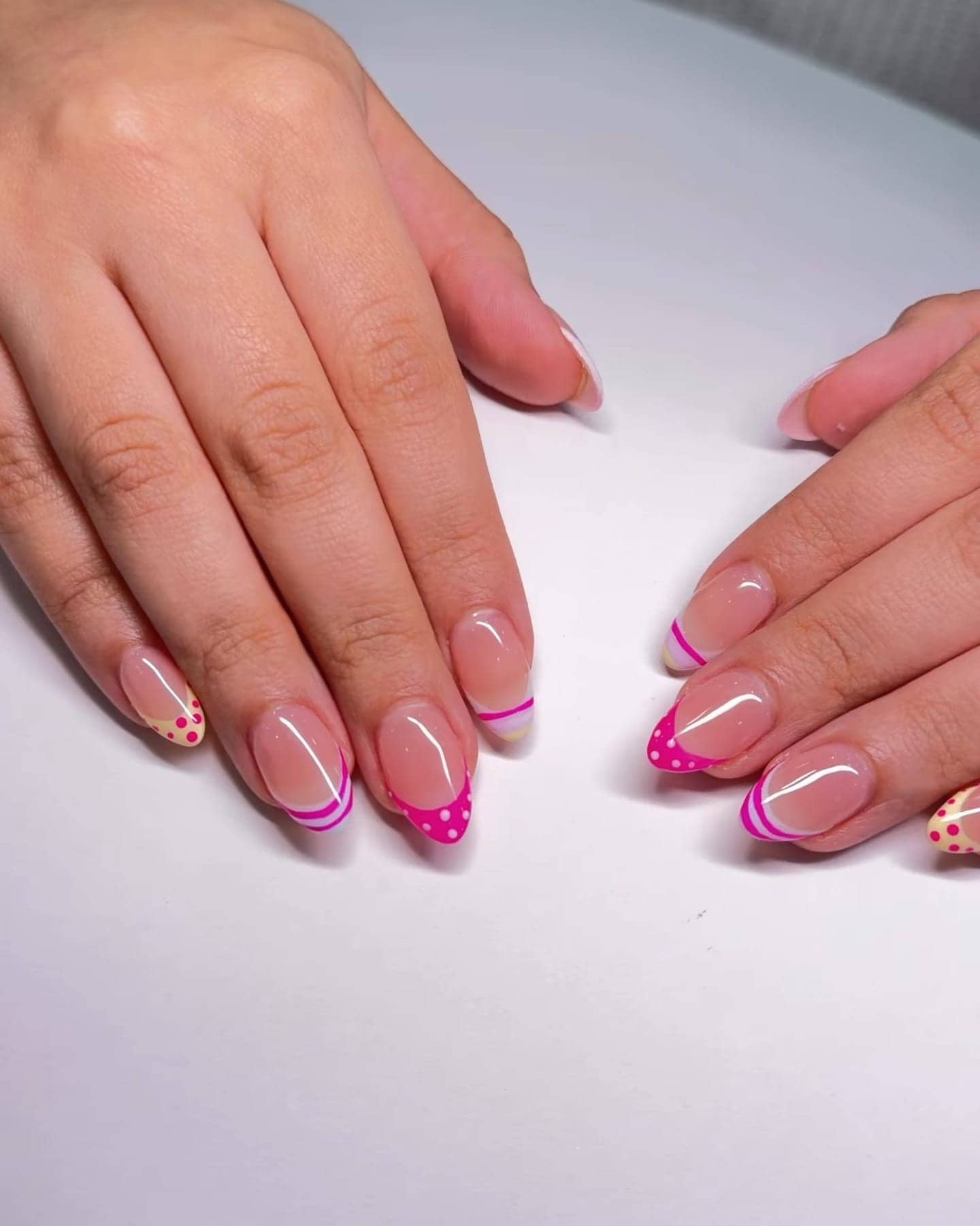 Hot pink French tips with tiny hearts
